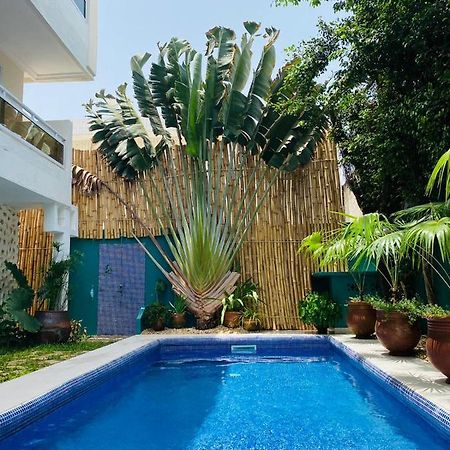 كوتونو L'Oasis Guesthouse المظهر الخارجي الصورة