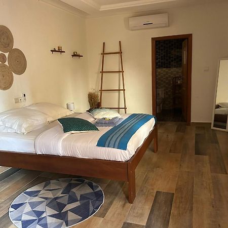كوتونو L'Oasis Guesthouse المظهر الخارجي الصورة