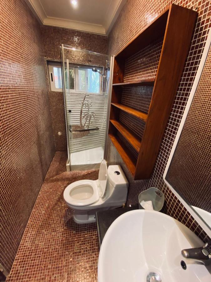 كوتونو L'Oasis Guesthouse المظهر الخارجي الصورة