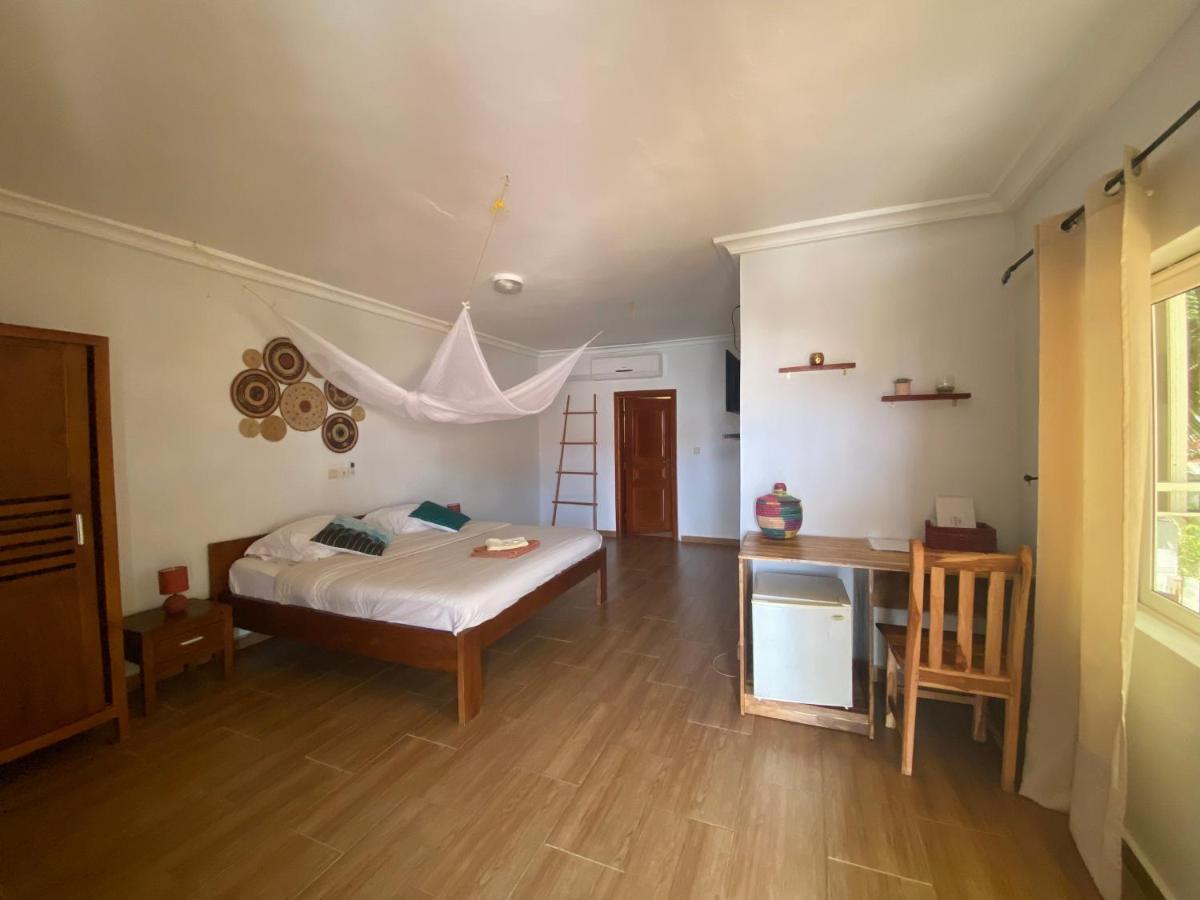 كوتونو L'Oasis Guesthouse المظهر الخارجي الصورة