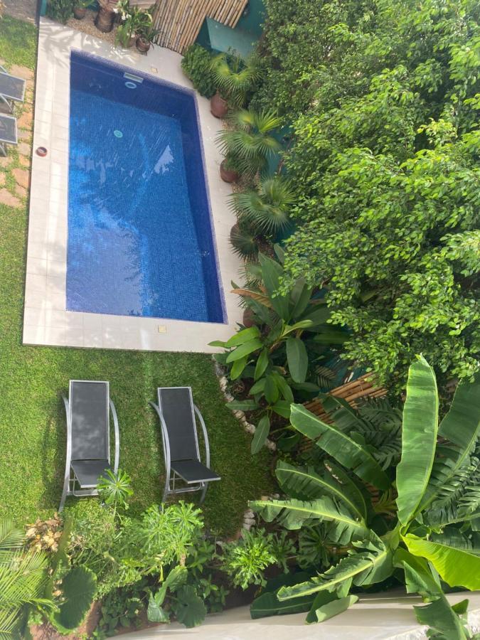 كوتونو L'Oasis Guesthouse المظهر الخارجي الصورة