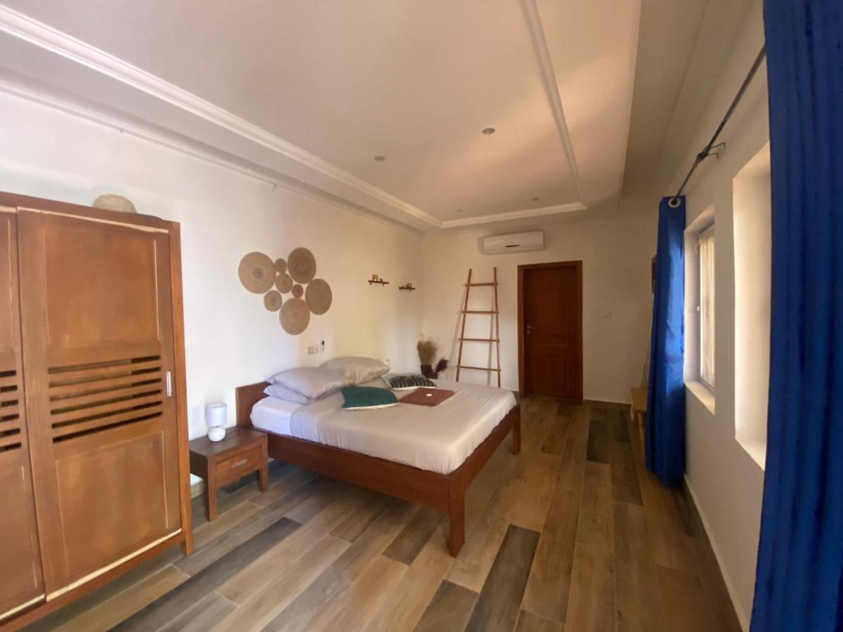 كوتونو L'Oasis Guesthouse المظهر الخارجي الصورة