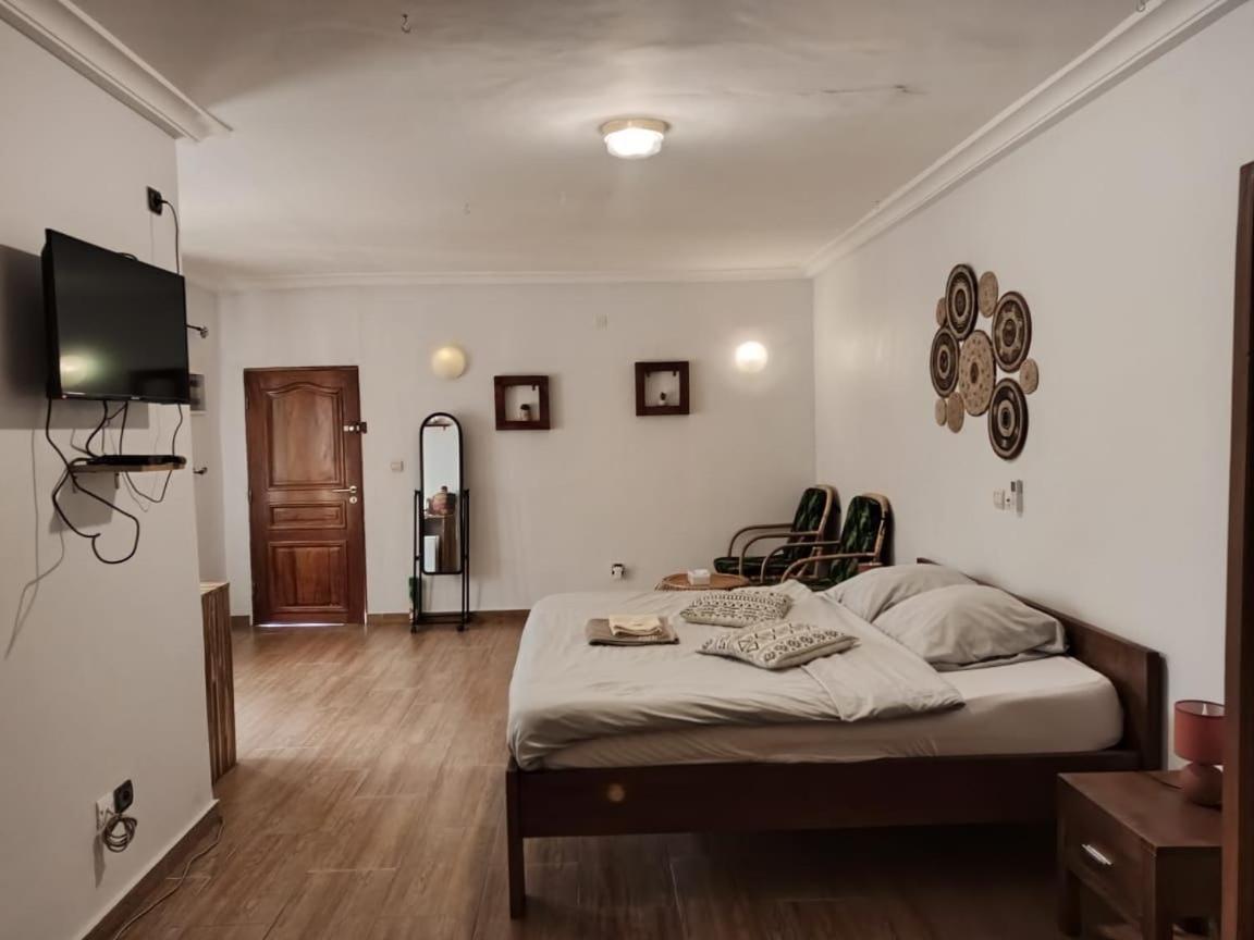 كوتونو L'Oasis Guesthouse المظهر الخارجي الصورة