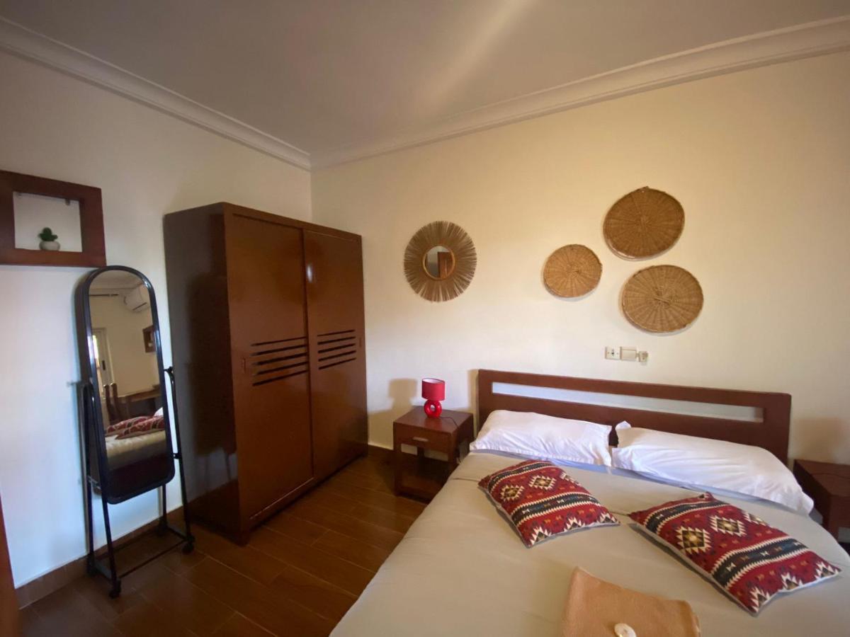 كوتونو L'Oasis Guesthouse المظهر الخارجي الصورة