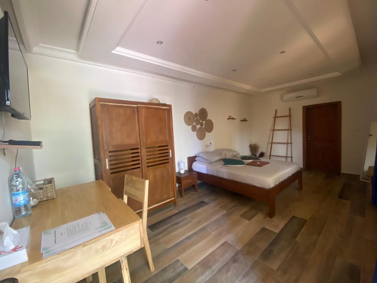 كوتونو L'Oasis Guesthouse المظهر الخارجي الصورة