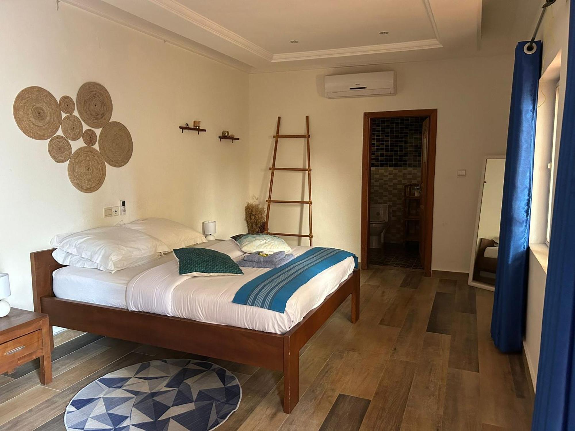 كوتونو L'Oasis Guesthouse المظهر الخارجي الصورة