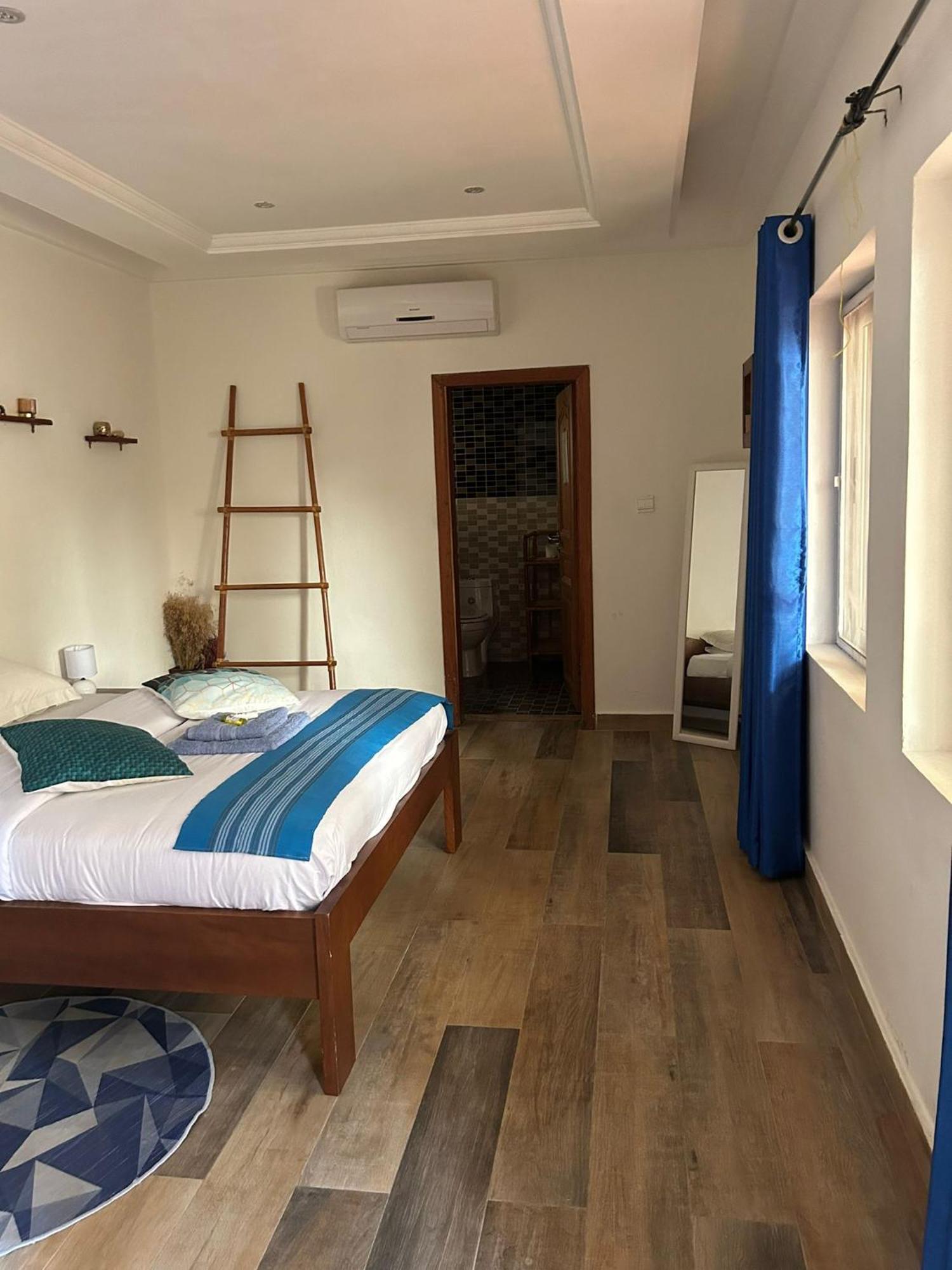 كوتونو L'Oasis Guesthouse المظهر الخارجي الصورة
