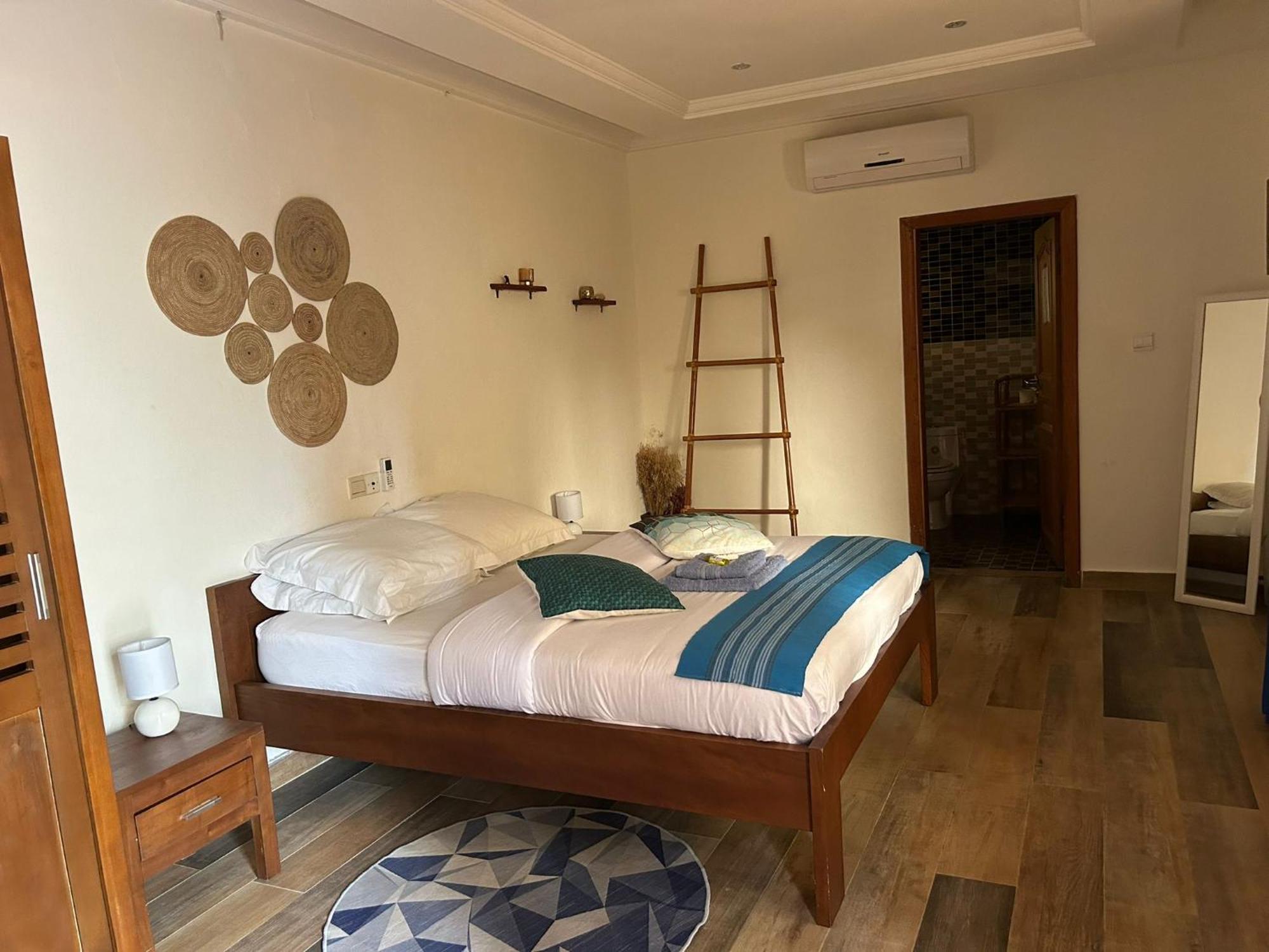 كوتونو L'Oasis Guesthouse المظهر الخارجي الصورة