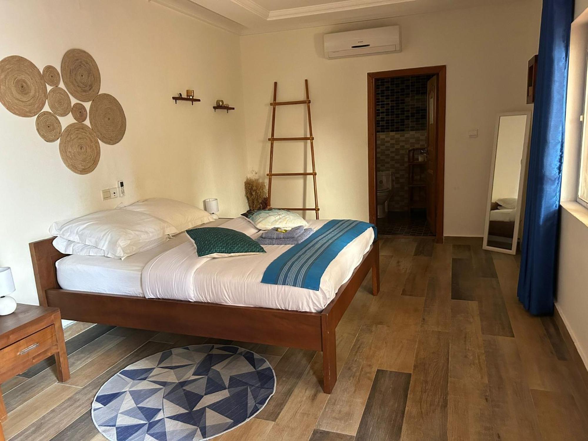 كوتونو L'Oasis Guesthouse المظهر الخارجي الصورة