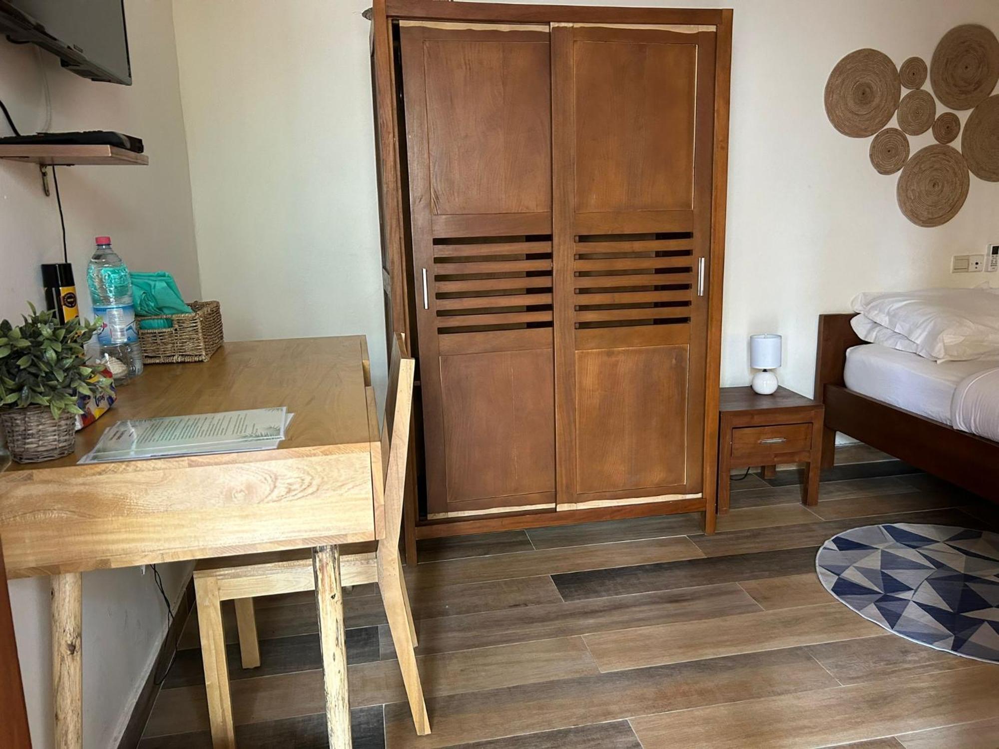 كوتونو L'Oasis Guesthouse المظهر الخارجي الصورة