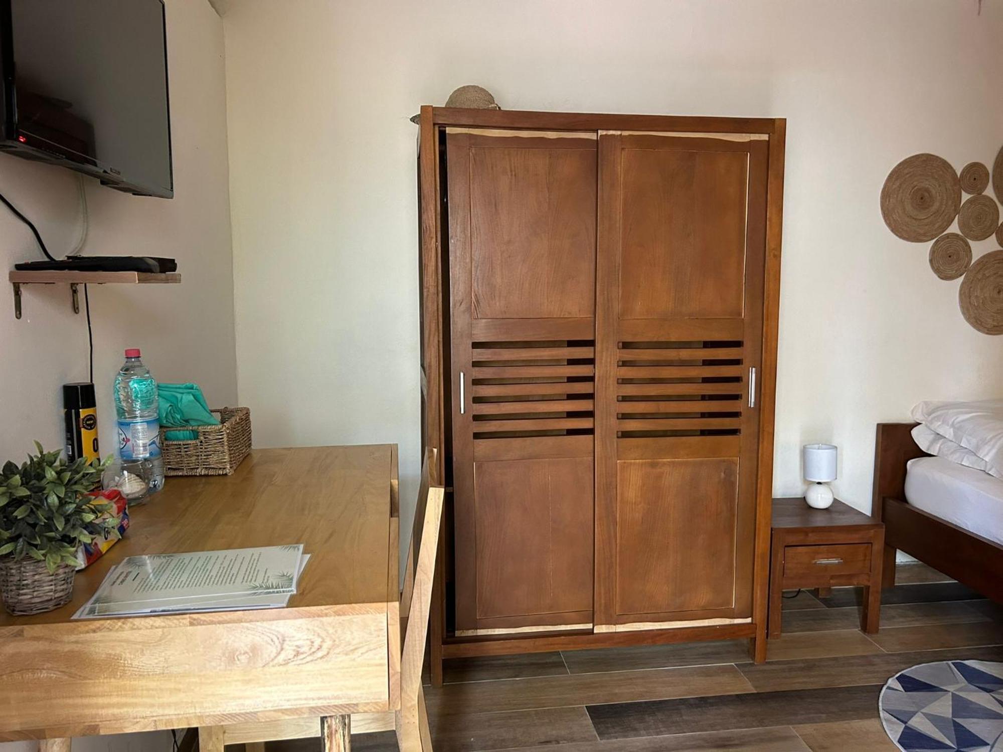 كوتونو L'Oasis Guesthouse المظهر الخارجي الصورة