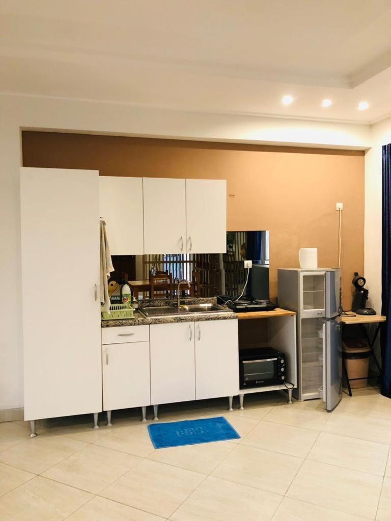 كوتونو L'Oasis Guesthouse المظهر الخارجي الصورة