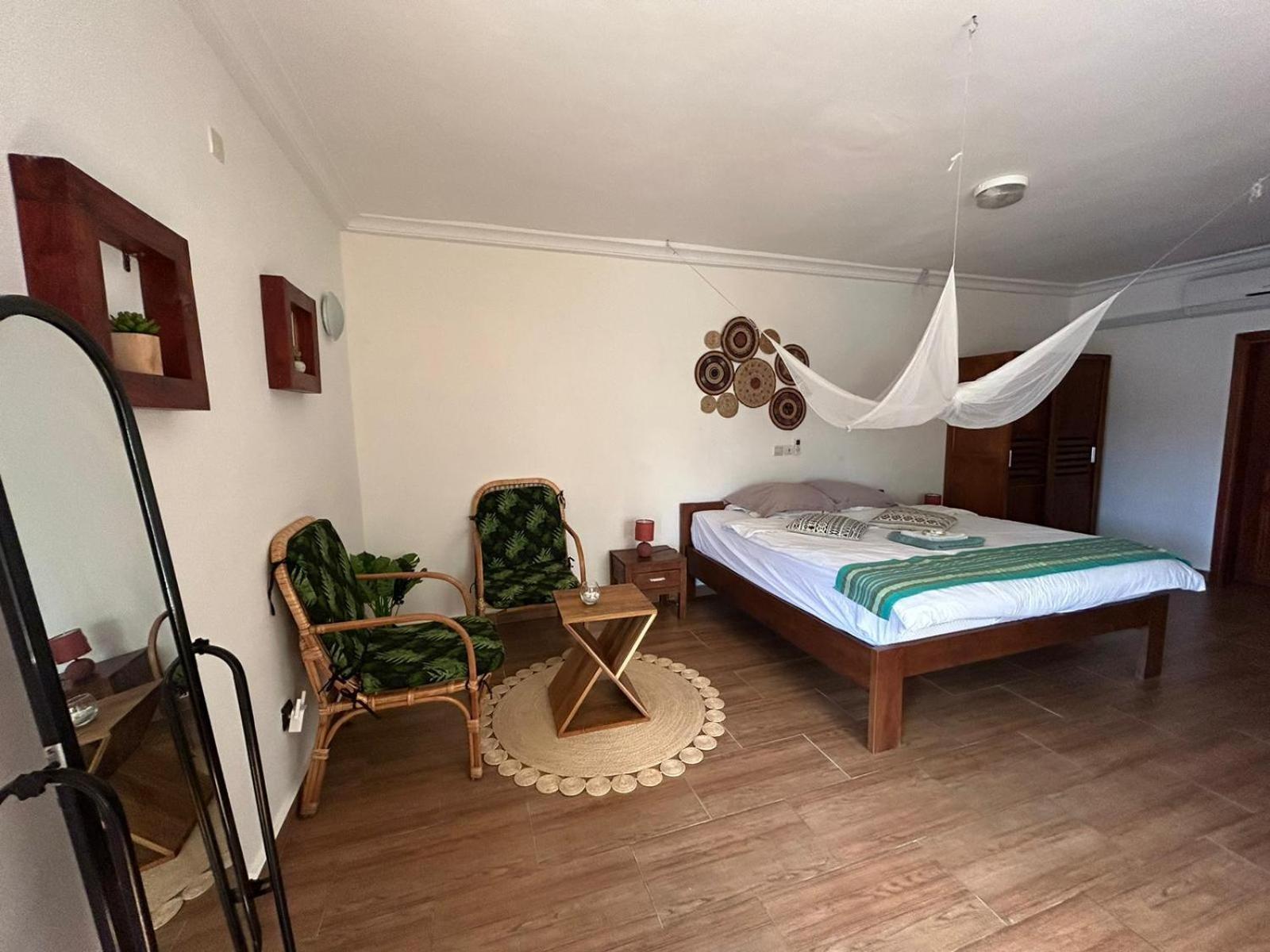 كوتونو L'Oasis Guesthouse المظهر الخارجي الصورة
