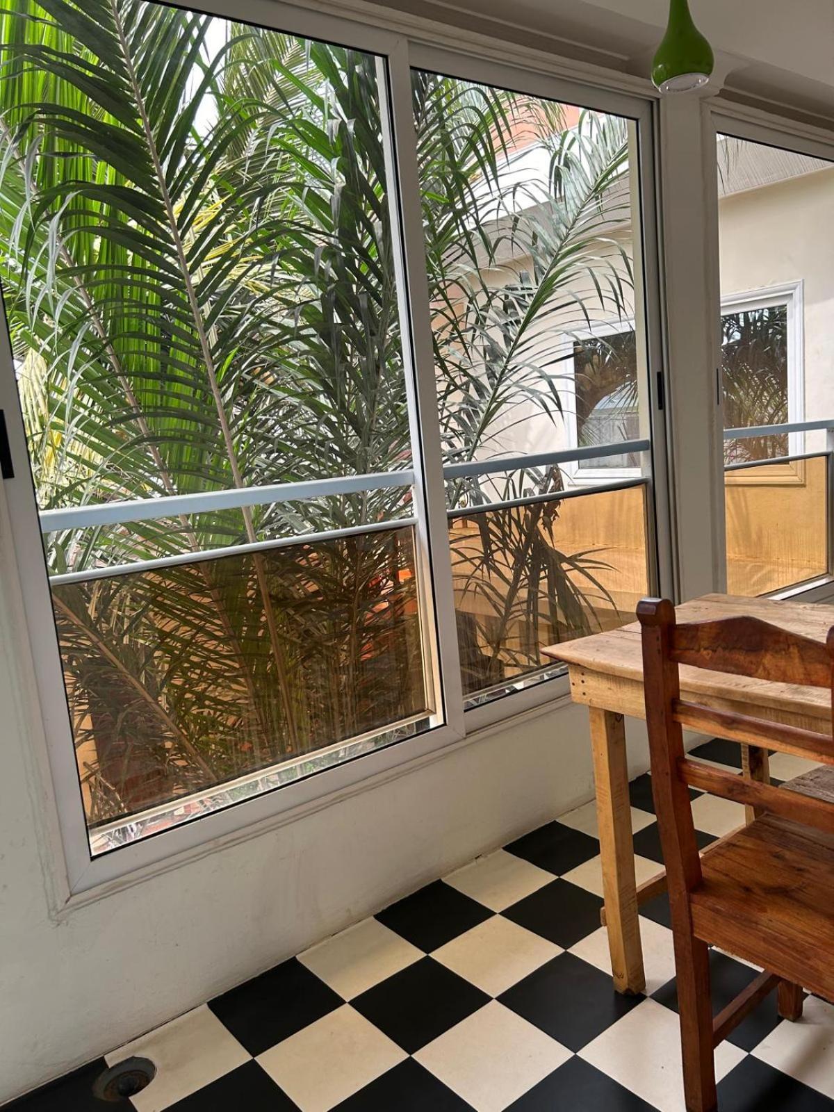 كوتونو L'Oasis Guesthouse المظهر الخارجي الصورة
