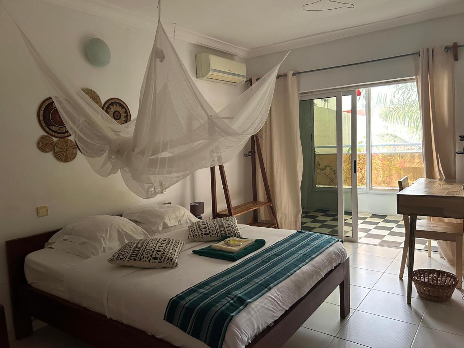 كوتونو L'Oasis Guesthouse المظهر الخارجي الصورة