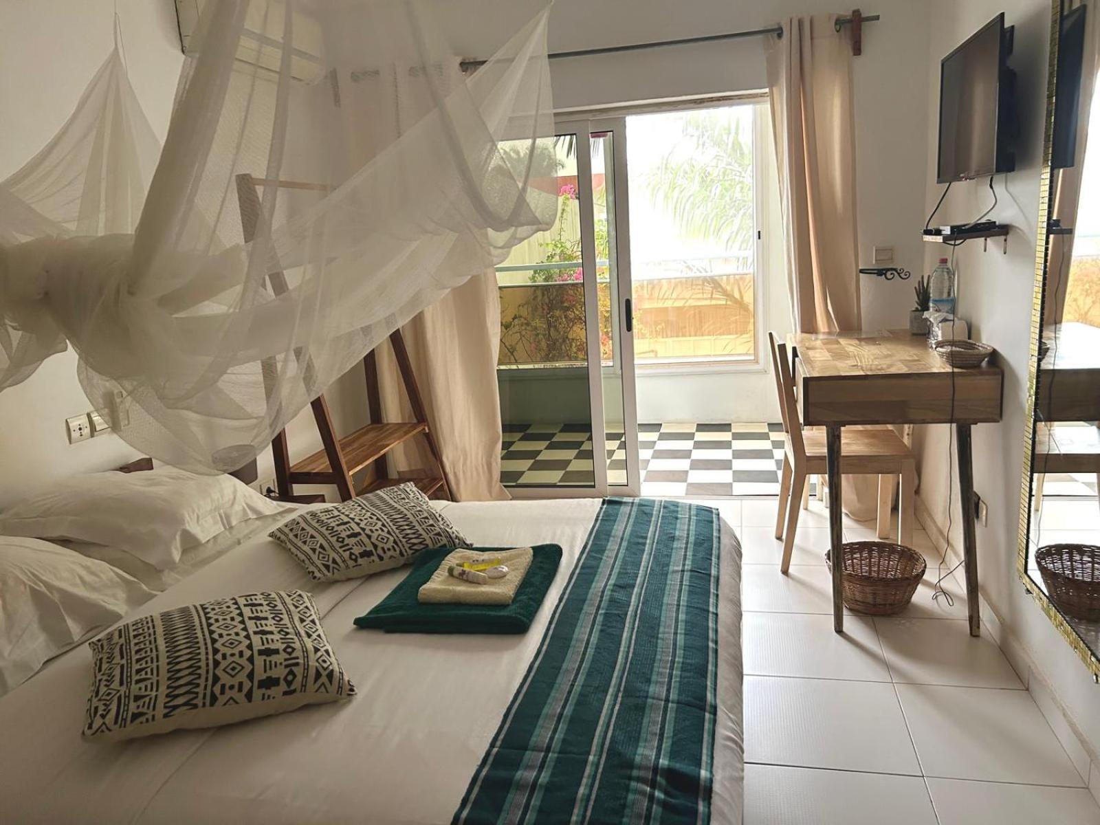 كوتونو L'Oasis Guesthouse المظهر الخارجي الصورة