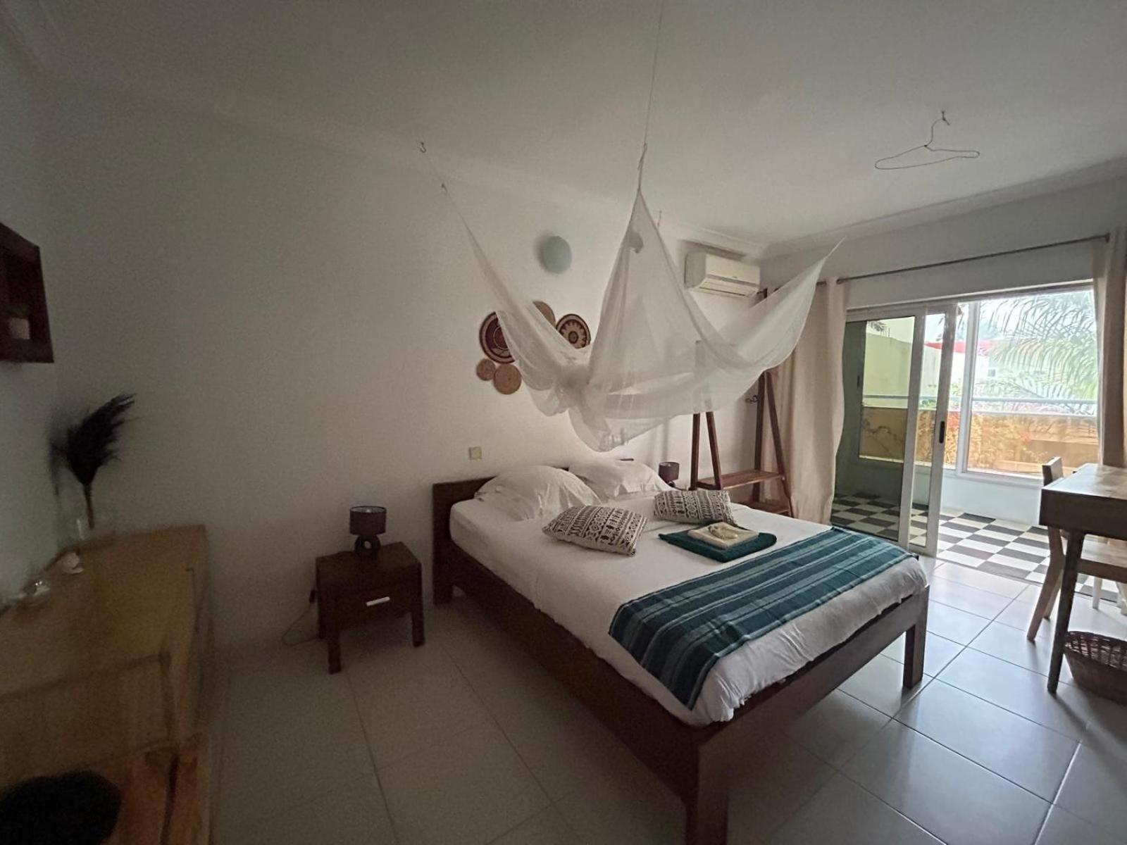 كوتونو L'Oasis Guesthouse المظهر الخارجي الصورة