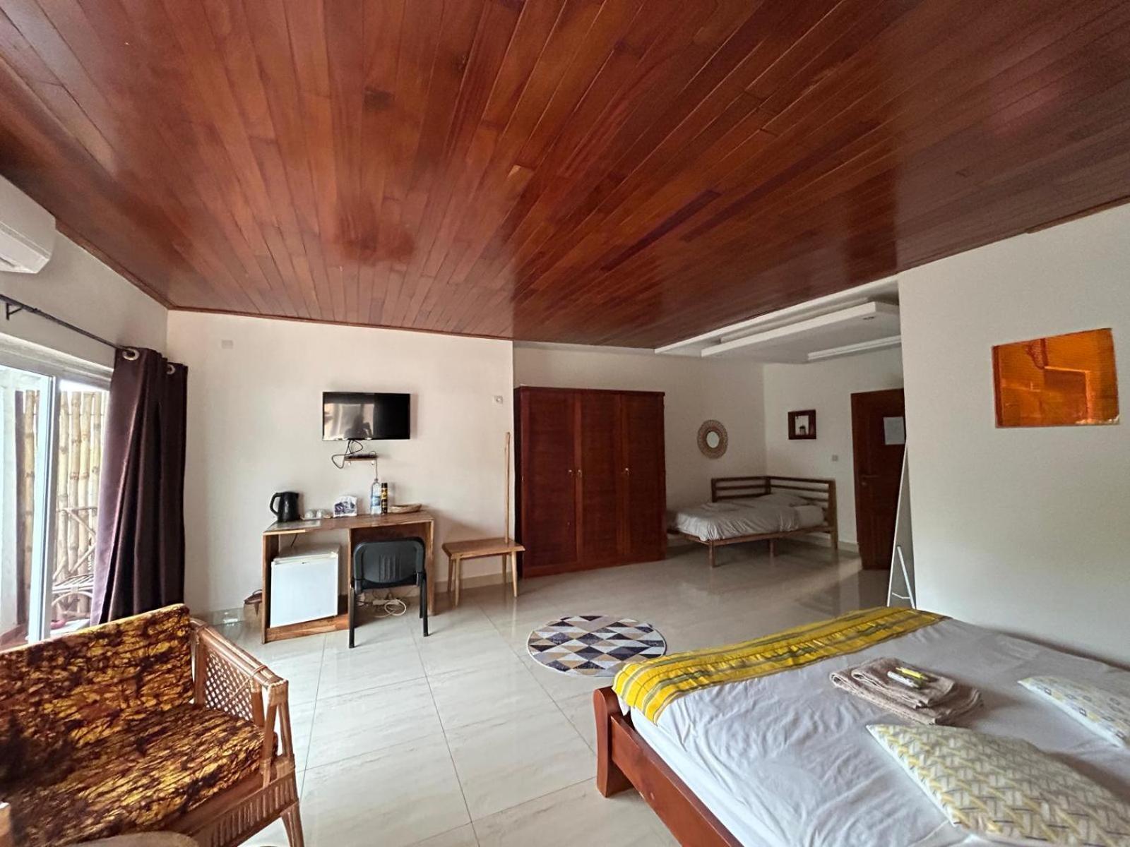 كوتونو L'Oasis Guesthouse المظهر الخارجي الصورة