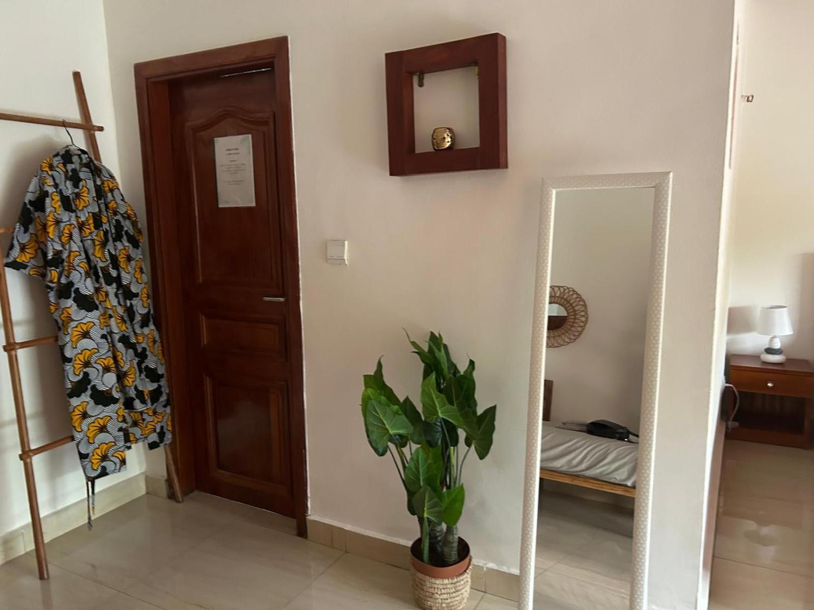 كوتونو L'Oasis Guesthouse المظهر الخارجي الصورة