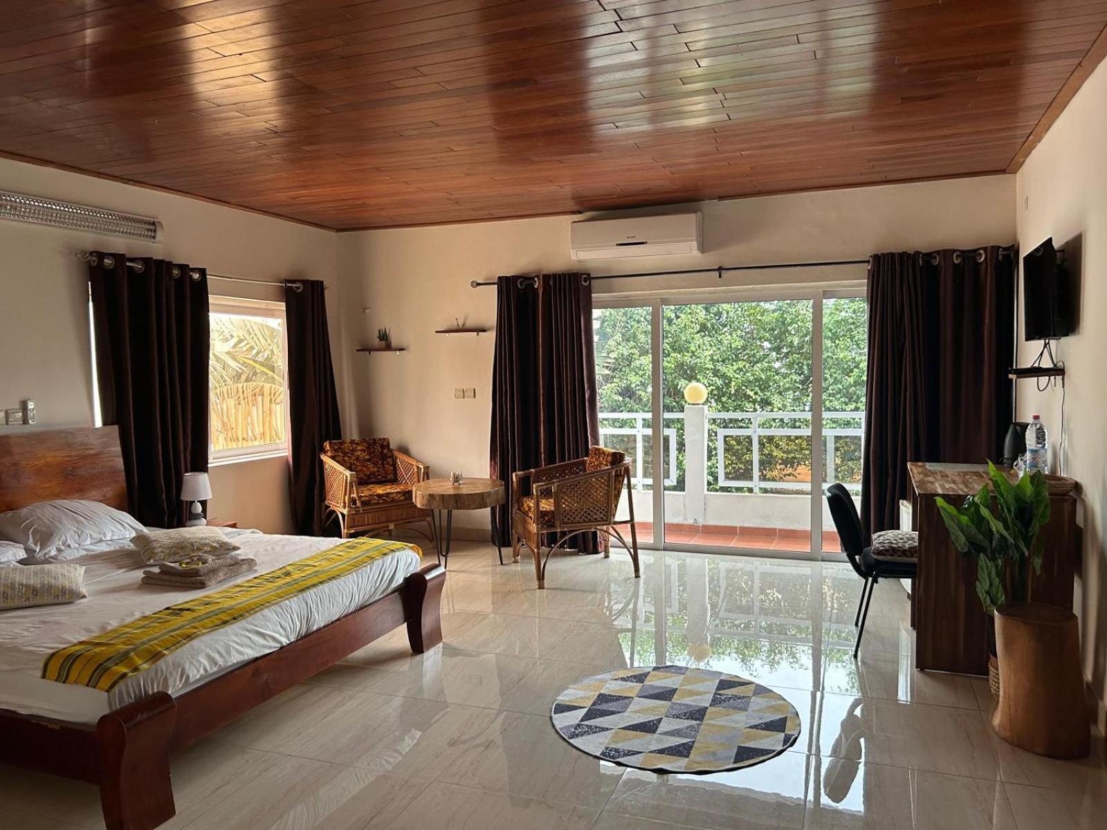 كوتونو L'Oasis Guesthouse المظهر الخارجي الصورة