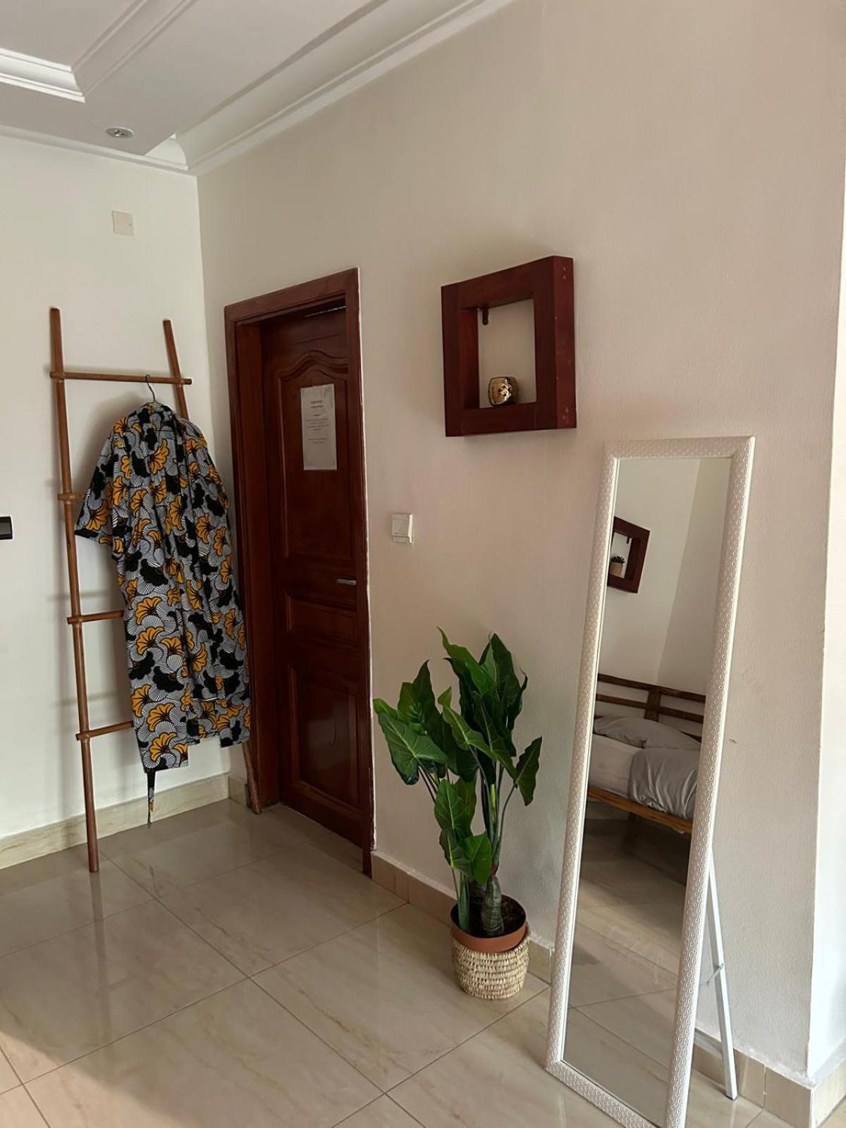 كوتونو L'Oasis Guesthouse المظهر الخارجي الصورة