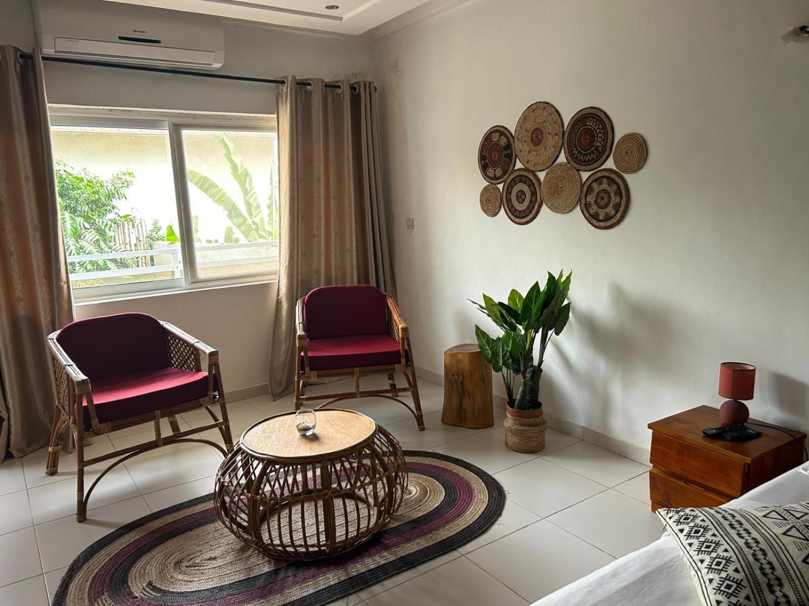كوتونو L'Oasis Guesthouse المظهر الخارجي الصورة