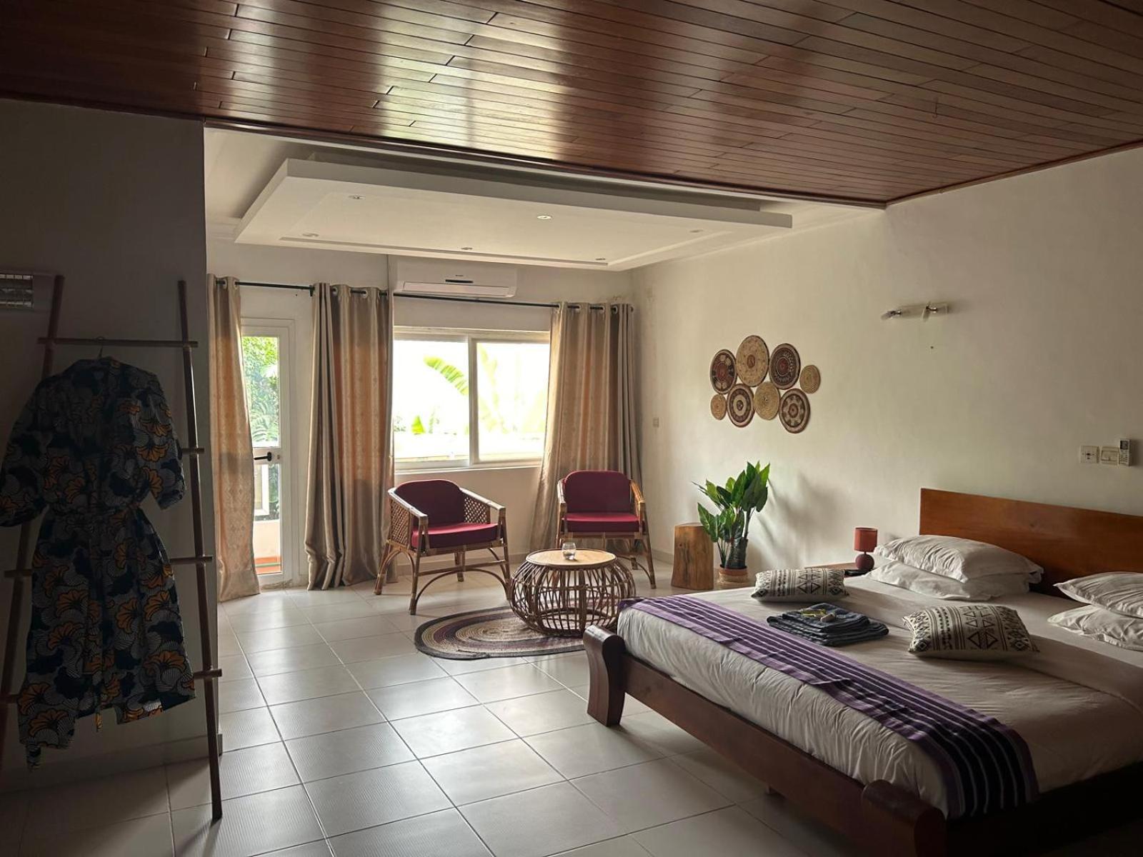 كوتونو L'Oasis Guesthouse المظهر الخارجي الصورة