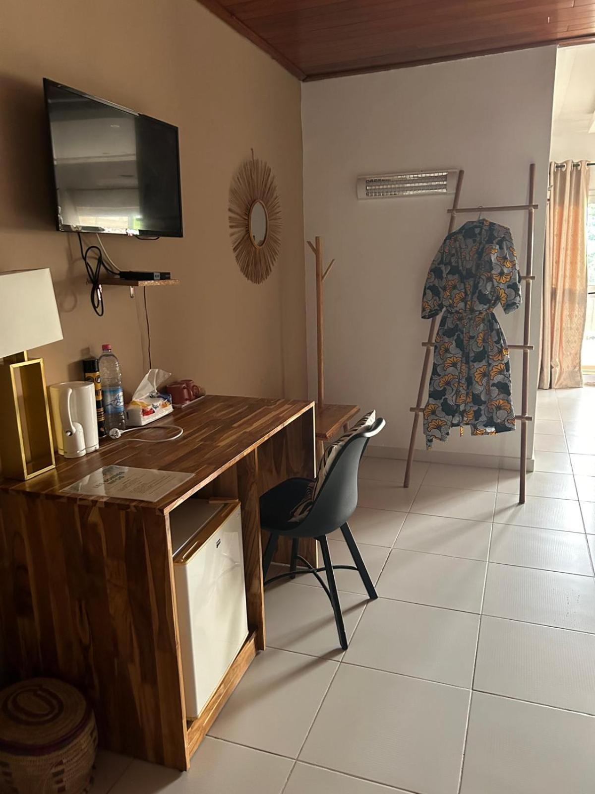 كوتونو L'Oasis Guesthouse المظهر الخارجي الصورة