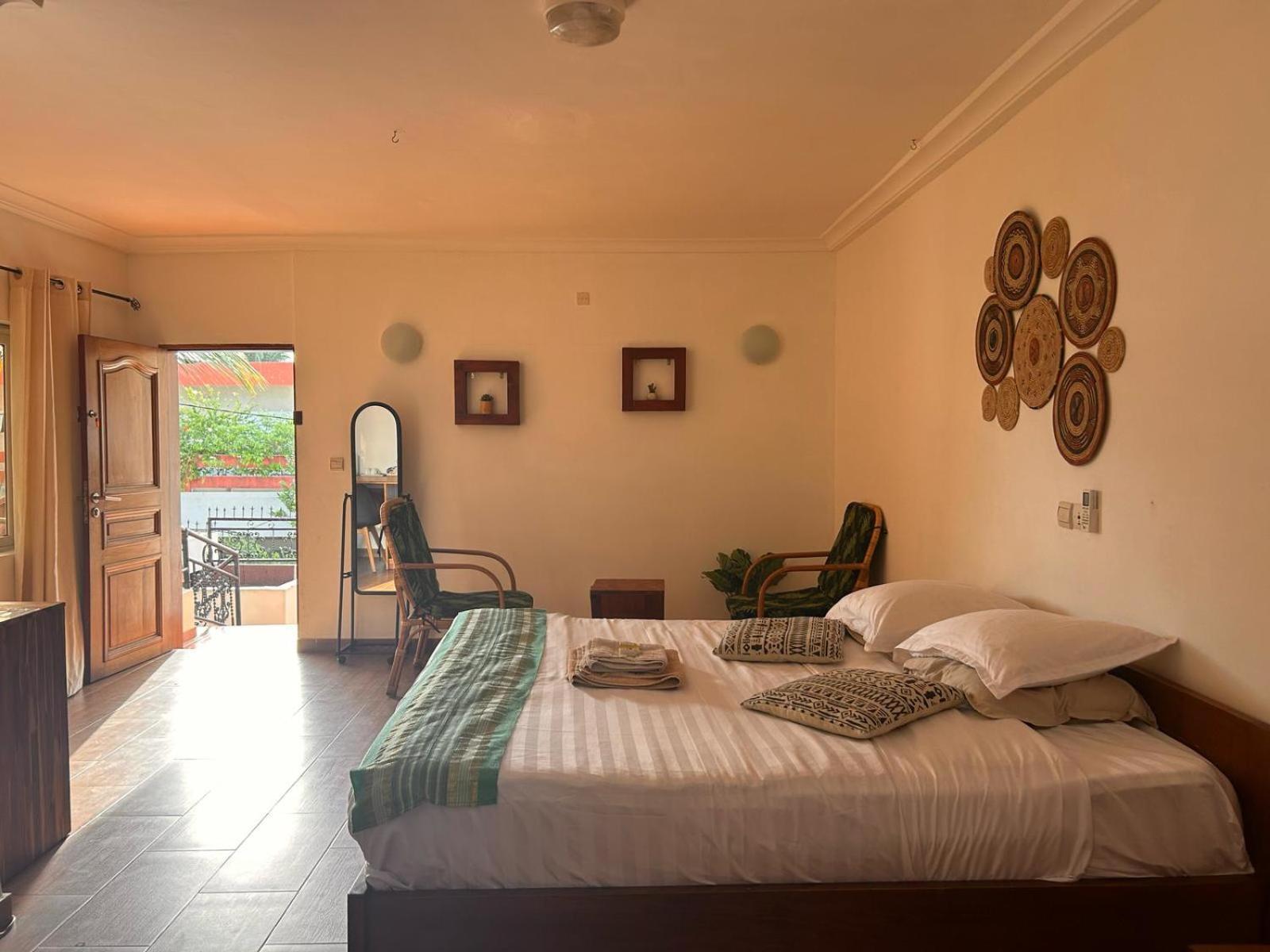 كوتونو L'Oasis Guesthouse المظهر الخارجي الصورة