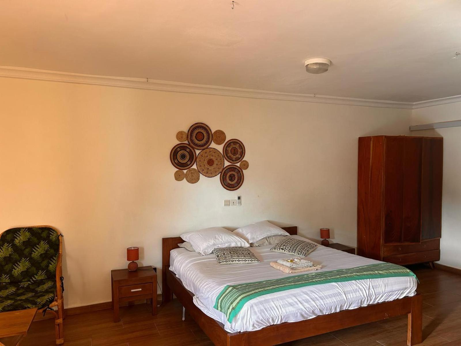 كوتونو L'Oasis Guesthouse المظهر الخارجي الصورة