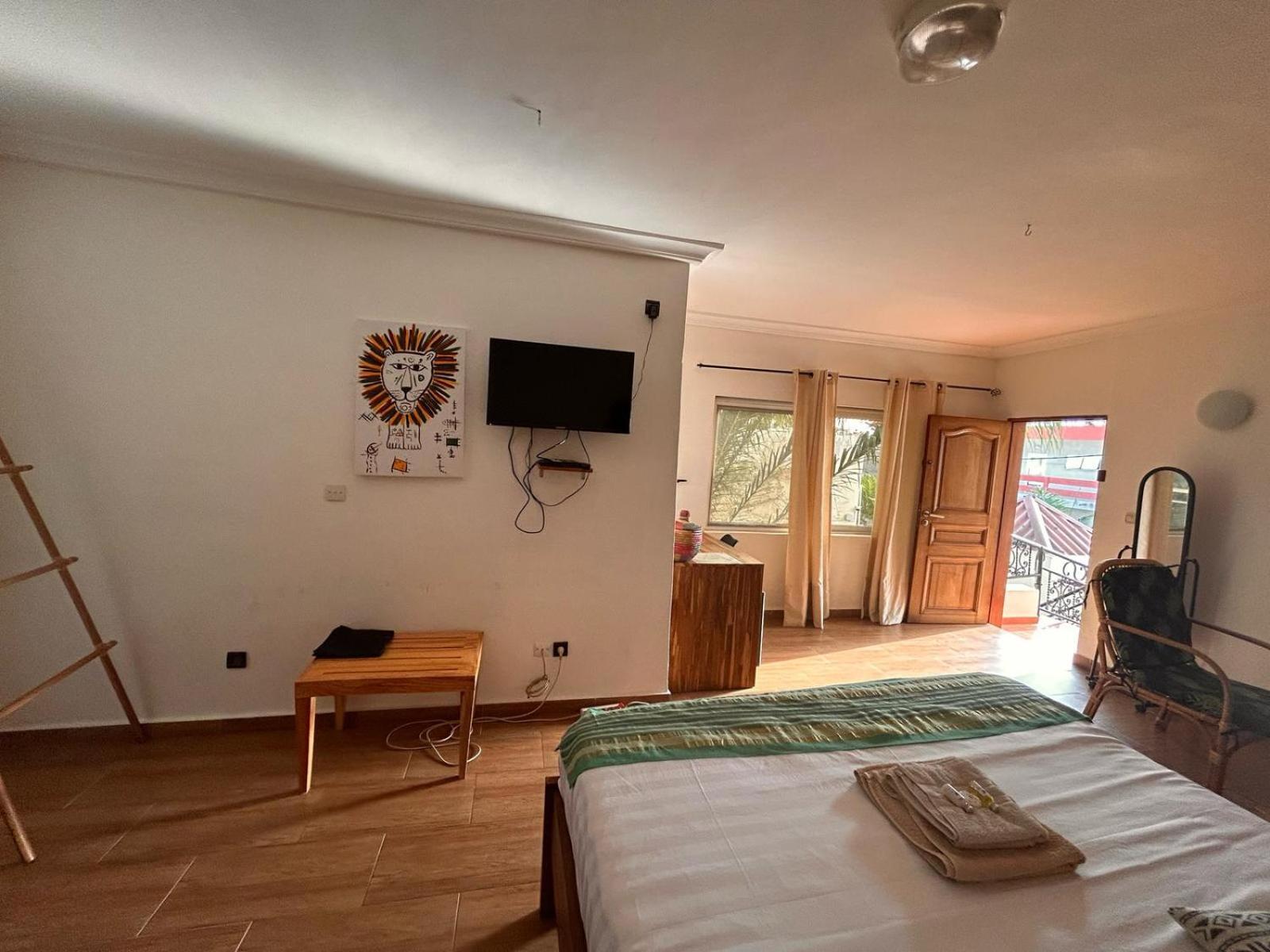 كوتونو L'Oasis Guesthouse المظهر الخارجي الصورة